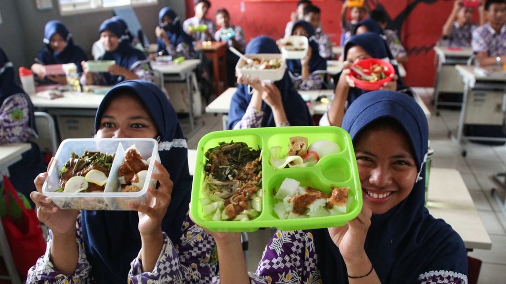 Grab dan OVO Gabung Program Makan Siang Gratis, Tuai Beragam Reaksi