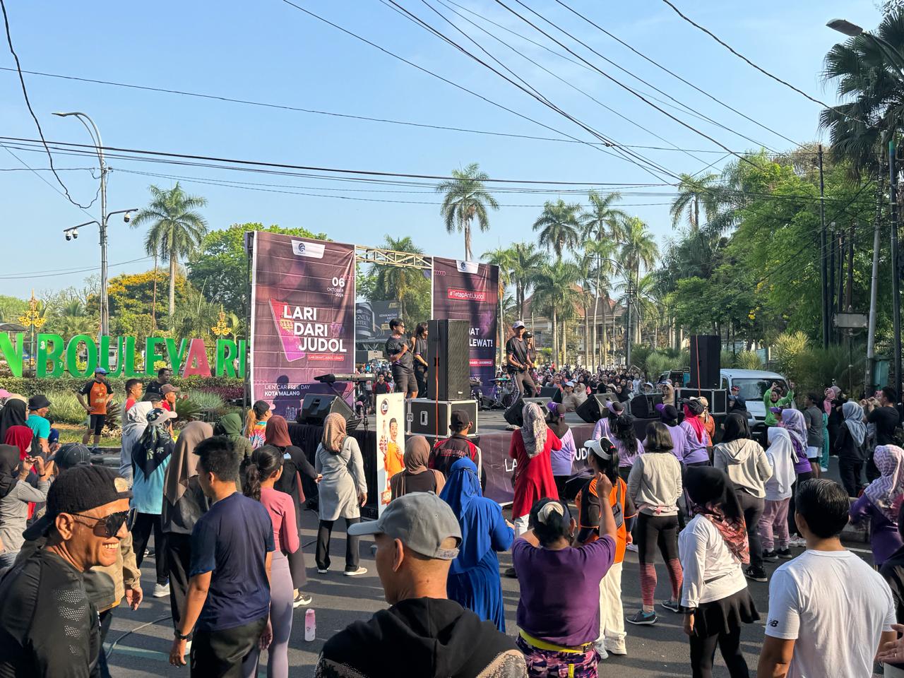 Kampanye Anti-Judi Online Giliran Dibawa Kemenkominfo ke Car Free Day Kota Malang dengan Tema Lari dari Judol 