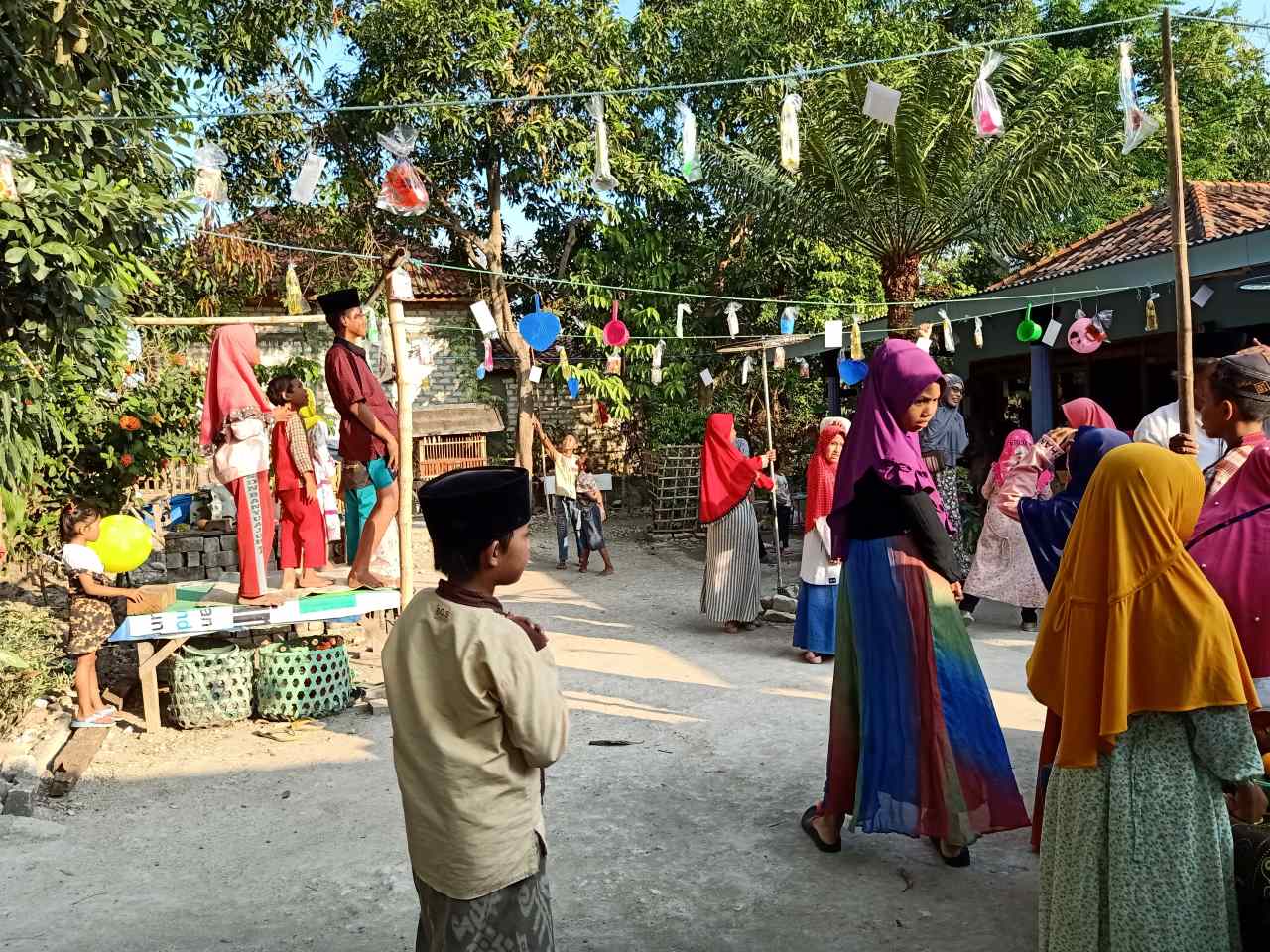 Folklor Maulid Nabi Muhammad yang Hidup di Kamal, Bangkalan: Ancak, Bukol, dan Berbagi