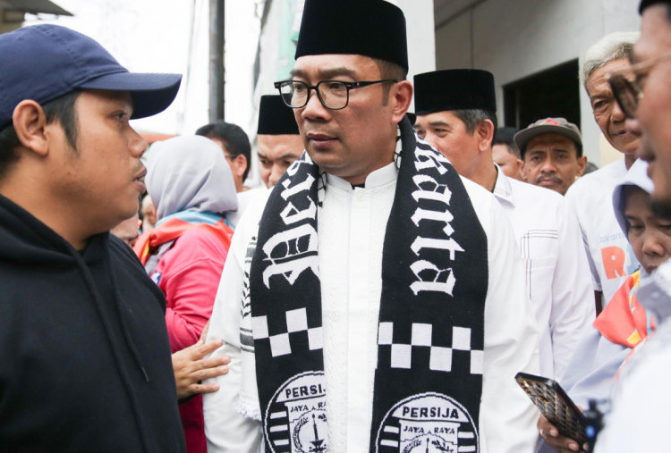 Jawaban Tegas Ridwan Kamil Ditantang Pakai Jersey Persija, Siap Dukung Lebih Kuat   