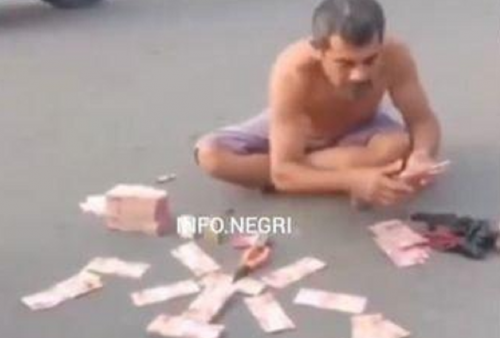 Viral Pria Bertelanjang Dada di Tapanuli Tengah Pamer Uang Rp 350 Juta Menghalangi Jalan: 'Ayo Tanding'