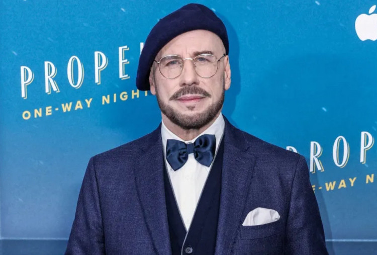 John Travolta Bangga Kenakan Beret di Cannes, Terinspirasi Sutradara Klasik