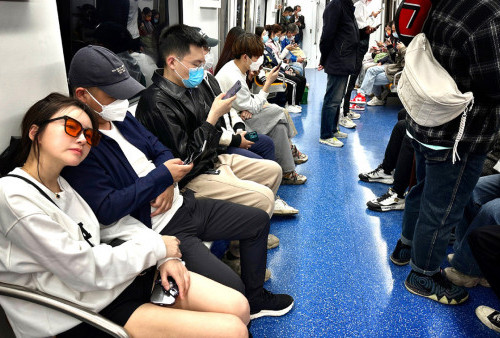 Sudah Move-On dari Pandemi, Tak Wajib Masker di Angkutan Umum Tiongkok