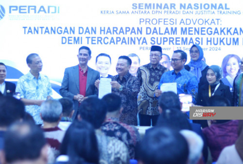 PERADI dan Justitia Training Center menandatangani Perjanjian Kerjasama untuk Kerjasama Pelatihan Hukum Berlanjutan dan Peningkatan Kompetensi Advokat. 