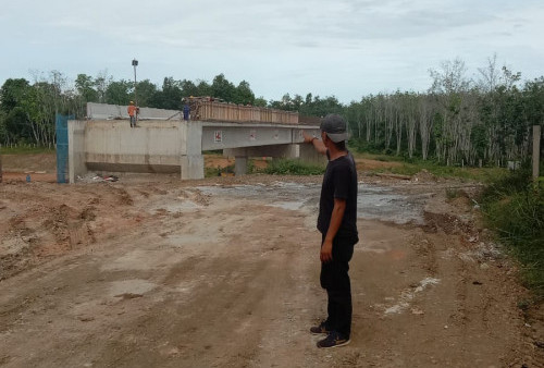 Rusak oleh Proyek Tol, Jalan Talang Batu Diperbaiki