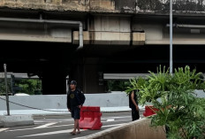 Viral Pak Ogah Jaga Palang Rantai di Exit Tol Rawa Buaya, Begini Penjelasan Operator Tol
