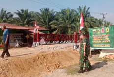 Akhiri Keterisolasian Warga Langkat, TNI dan PTPN IV PalmCo Bangun Jembatan Darurat